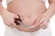 Pregnant belly with cigarettes