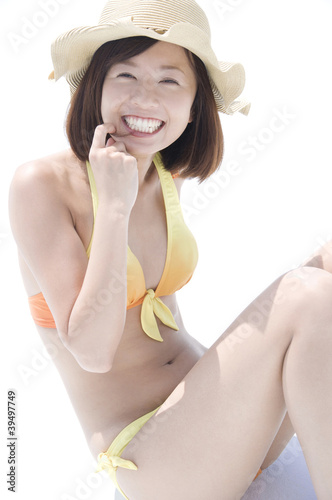 Photo: 笑顔の水着女性 笑顔の水着女性