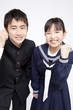 Foto: ガッツポーズをする中学生男女 ガッツポーズをする中学生男女