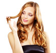Beautiful girl with long wavy hair isolated on a white