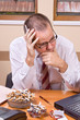 Worried businessman with cigarette