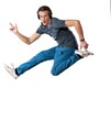 Handsome man with headphones jumping.