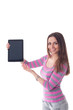 Happy brunette woman holding in hand a tablet touch pad computer