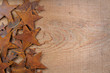 Rusty stars on a wooden background
