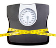 A bathroom scale with a measuring tape