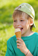 Portrait a young boy eating a tasty ice cream