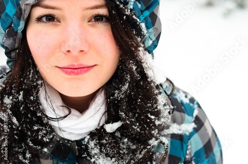Photo: Young woman with snow in her hair Young woman with snow in her hair