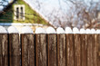 Old wooden fence covered with snow Old wooden fence covered with snow