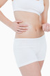 Young woman wearing underwear with her hand on her hip