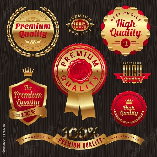 Vector: Set of golden quality labels and emblems Set of golden quality labels and emblems