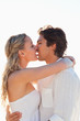 Side view of kissing couple against the sunset