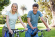 Couple spending their day on their bikes in the park