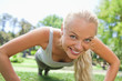 Sportswoman doing push ups