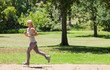 Side view of a jogging woman