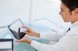 Businessman using a touch pad