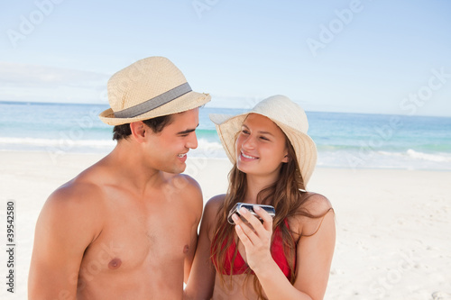 Photo: Close-up of lovers smiling in swimsuit Close-up of lovers smiling in swimsuit