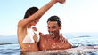Happy couple in a swimming pool