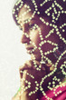 Close up of woman praying behind veil