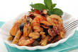 CONCHIGLIA CON PENNETTE E CONDIMENTO DI MARE