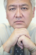 Businessman posing intently