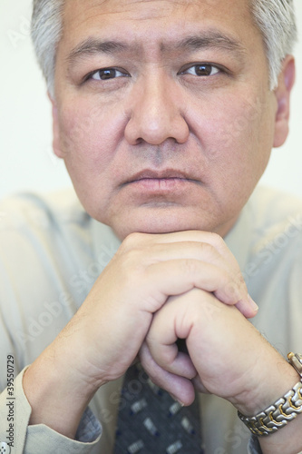 Photo: Businessman posing intently Businessman posing intently
