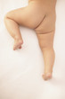 Naked baby's bottom and legs