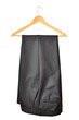 Men's black pants on a hanger