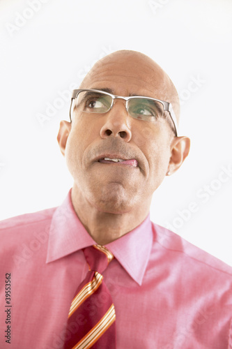 Photo: Close up of businessman concentrating Close up of businessman concentrating