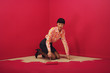 Woman painting herself into a corner