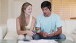A woman cutting her credit card