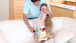 Man offering a rose and a ring to his wife