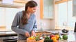 Brunette woman cooking