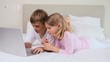 Video: Cute siblings using a laptop Cute siblings using a laptop