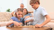 Video: Smiling siblings playing chess Smiling siblings playing chess