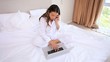 Video: Serious brunette using her laptop Serious brunette using her laptop