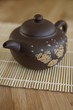 Small Asian ceramic teaot with cherry blossom motif