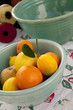 Fresh citrus fruits in a vintage ceramic bowl
