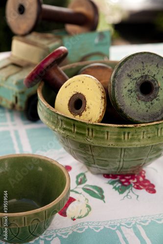 Photo: Vintage ceramic mixing bowls with wooden spools Vintage ceramic mixing bowls with wooden spools