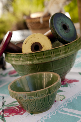 Photo: Vintage ceramic mixing bowls with wooden spools Vintage ceramic mixing bowls with wooden spools