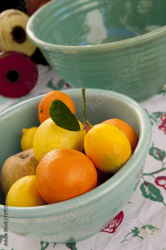 Photo: Fresh citrus fruits in a vintage ceramic bowl Fresh citrus fruits in a vintage ceramic bowl
