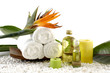 Photo: wooden bowl of towel and spring flower with massage oil wooden bowl of towel and spring flower with massage oil