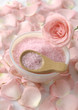 pink petals of roses and burning candles