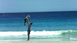 Father throwing his son in slow motion