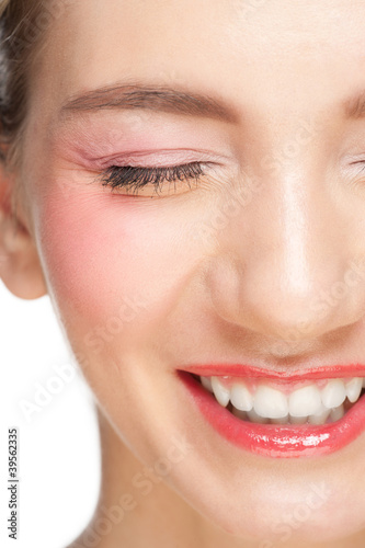 Photo: Closeup of beautiful woman laughing Closeup of beautiful woman laughing