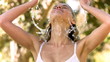 Video: Woman splashing herself in slow motion Woman splashing herself in slow motion