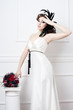 Portrait of beautiful retro bride with wedding bouquet