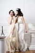 Two sisters brides having fun