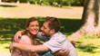 Couple in slow motion hugging each other
