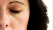 Woman in slow motion opening her eye