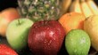 Water raining on fruits in super slow motion